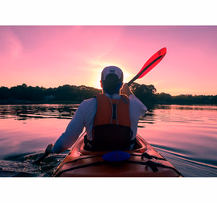 Landscape wall mural kayaker sunset reflection - TenStickers