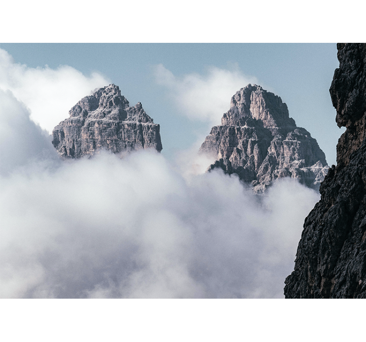 Mountain wall mural majestic peaks above clouds - TenStickers