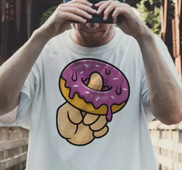 Kids t-shirt finger holding donut design - TenStickers